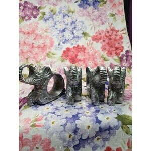 Lot of Four Elephant Napkin Rings